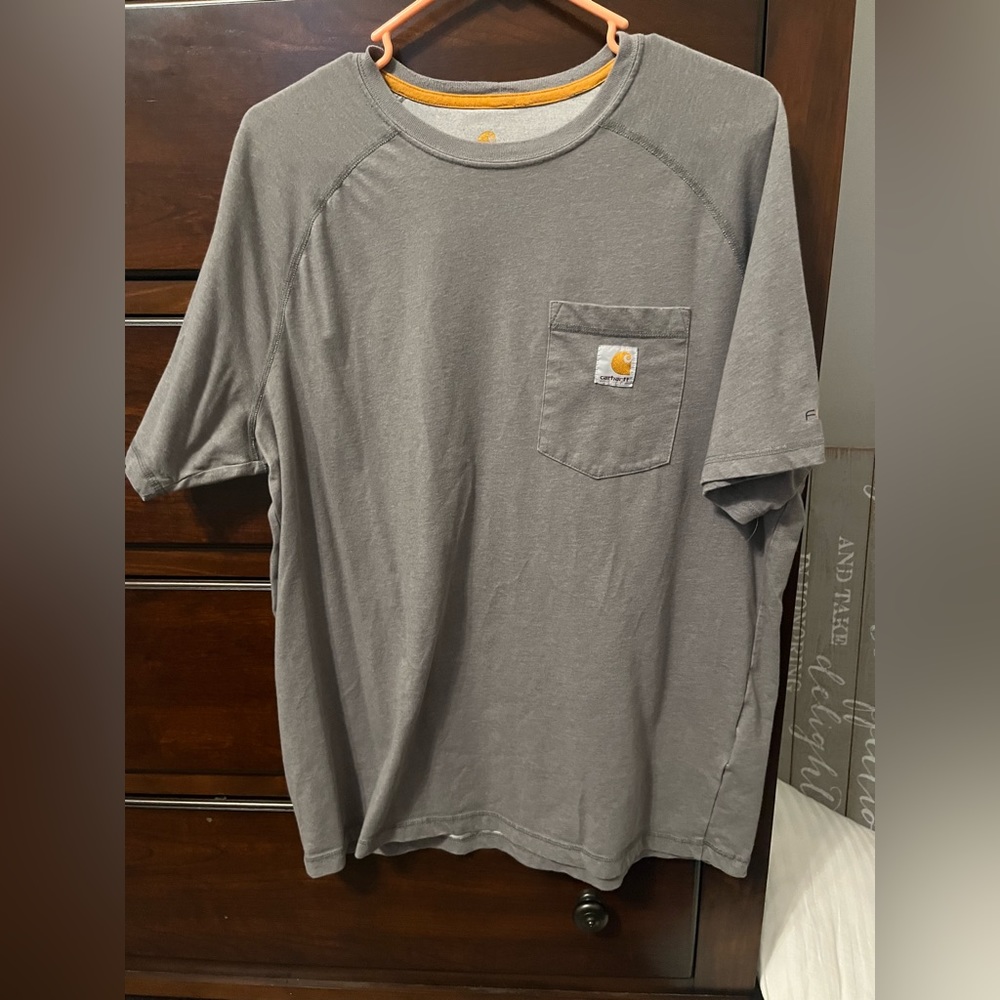 Set of 3 men’s size Large Carhartt shirts. Relaxed fit black, tan, and gray GUC